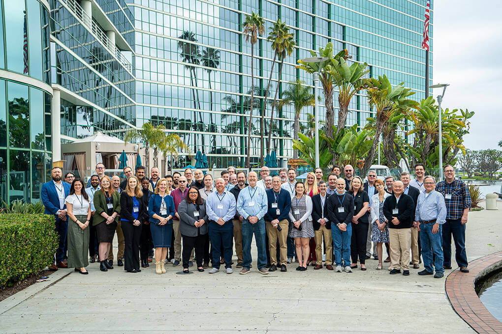 A group photo of the CI4MF 2024 attendees outside the conference hotel in Long Beach, California. Photo/Angie Hubert, NDR.