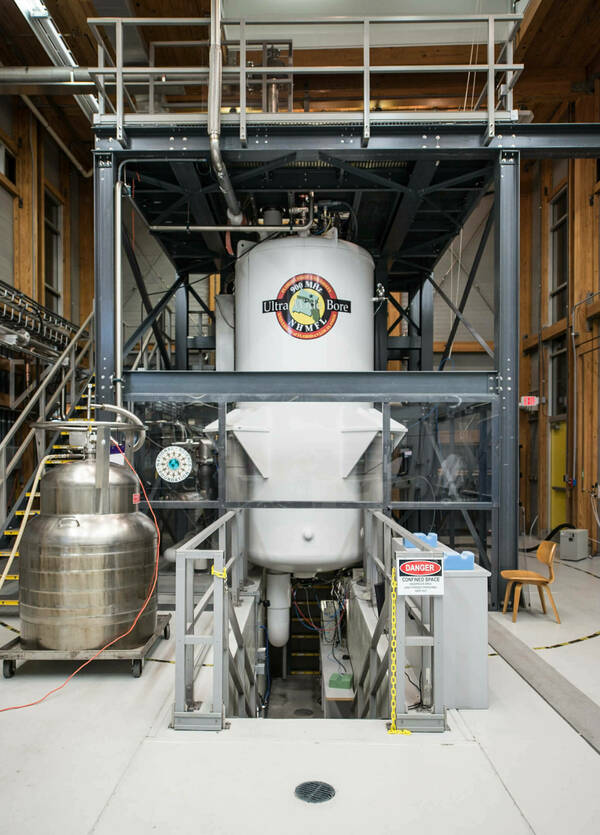 The 900MHz 105mm Ultra Wide Bore Magnet at the National High Magnetic Field Laboratory is seen here within a metal rigging structure.